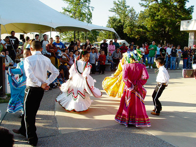Children share a cultural dance during a celebration at Christ the King Parish in Southaven. 