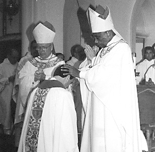 Retired Bishop Joseph Howze, 91, a native of Daphne, Ala., and the first bishop of Biloxi, Miss., proudly displays a plaque recognizing his induction into the University of Mississippi’s Alpha Phi Circle of Omicron Delta Kappa as an honorary member in 1988. In an interview Bishop Howze recalls his life and ministry when the South was segregated and describes the racial division and healing he has witnessed over the years. (CNS photo/Juliana Skelton, Gulf Pine Catholic)