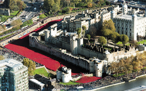 An aerial view shows visitors looking at the Tower of London's poppy installation in London Nov. 4. The ceramic poppies symbolize the end of World War I and Remembrance Day, Nov. 11. (CNS photo/Hannah McKay, EPA)