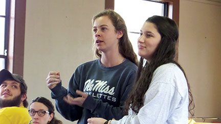 Mary Kate Domino, left, a student at the University of Mississippi speaks at the 2014 College campus ministry retreat. (Mississippi Catholic file photo)