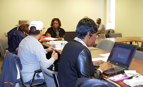 Several veterans attended one of the job search sessions offered by Catholic Charities on Mondays and Thursdays from 10 a.m. - noon and 1 - 3 p.m. In back center is LaQuita Johnson, outreach specialist, on hand to assist with questions.