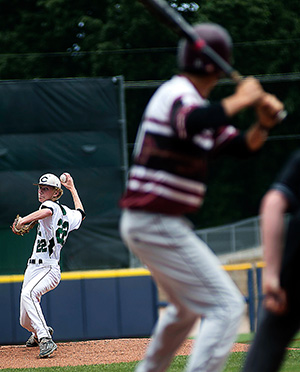 Green Wave pitcher, Gabe Smith, winds up to deliver a pitch in Cathedral’s 4-2 victory of Smithville for the State 1A championship May 22. (Photo courtesy The Natchez Democrat)