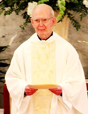 Father Francis Cosgrove, pictured at his Jubilee Mass in Merdian is retiring to St. Catherine's Village in Madison. (Mississippi Catholic file photos)