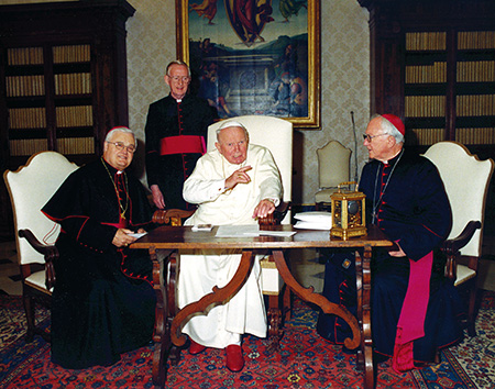 Bishop Joseph Latino, (left)  newly ordained to the Diocese of Jackson, Msgr. Michael Flannery, then-vicar general, St. John Paull II and Bishop Houck in Rome in November 2004. Bishop Houck was retired, but was in Rome with Extension when Bishop Latino made his first ad limina visit so the three visited the pope together. (Mississippi Catholic Archive Photo) 
