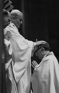 Saint John Paul II ordains Bishop Houck in Rome. Almost 30 bishops were ordained by the then-pope during one Mass. 