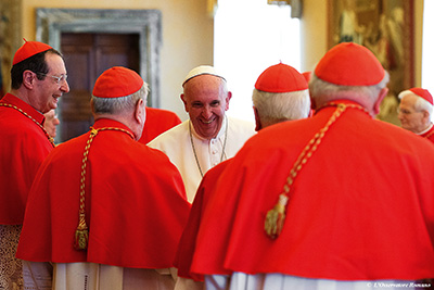 Pope Francis greets cardinals during an “ordinary public consistory” to formally conclude sainthood causes at the Vatican March 15. Among new saints to be made are Mother Teresa of Kolkata, whose canonization will take place at the Vatican Sept. 4. (CNS photo/L’Osservatore Romano, handout) 