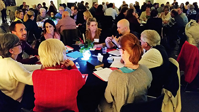 Members of St. Paul’s Discovering Christ groups discuss the questions posed by the seven-week program. A second session is set to start March 31. (Photo by Monica Walton).