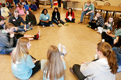 NATCHEZ – Young people from seven parishes gathered at St. Mary Basilica for a multi-parish youth day in March. College students joined in some of the ice breakers and then met with the high school students. (Photos courtesy of Carrie Lambert)