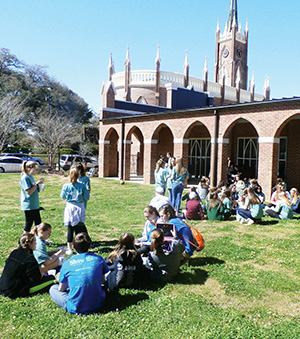 Students in Natchez enjoyed a picnic lunch during their youth day.