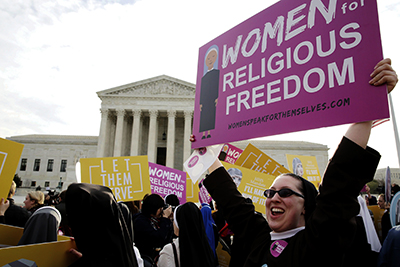 Women religious lobby against the Affordable Care Act's contraceptive mandate March 23 on the steps of the U.S. Supreme Court ahead of oral arguments in Zubik v. Burwell in Washington. (CNS photo/Jim Lo Scalzo, EPA)