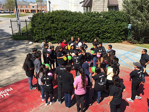 Youth gather on the grounds of St. Joseph Church to do an activity during the retreat. The activities were focused on reflecting on how to be open to assist others in need. 