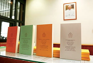 Copies of Pope Francis' apostolic exhortation on the family, "Amoris Laetitia" ("The Joy of Love"), are seen during the document's release at the Vatican April 8. (CNS photo/Paul Haring) 