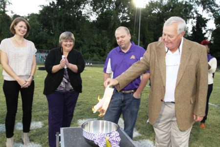 Vicksburg Catholic School burns building note. VICKSBURG – Ann Roberson, Vicksburg Catholic School Development Director; Mary Arledge, St. Francis Xavier Principal and Riley Nelson, Advisory Council President, look on with joy as Dr. Buddy Strickland, principal for Vicksburg Catholic Schools, “burns the note” for the Sam P. Scott Building. The happy ceremony kicked off the St. Aloysius vs. Greenville St. Joseph Football game. Vicksburg Catholic School made the final payment on the debt for the building in August. This year’s annual appeal is to focus on technology improvements. (Photo courtesy of Ann Roberson)