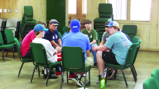 The young people divided into small groups for discussions and sharing. 