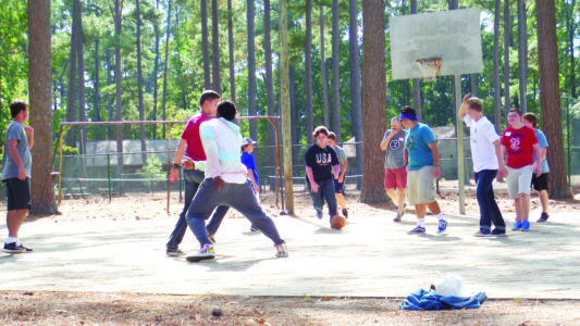 Members of NET's team organized sporting activities such as basketball. 