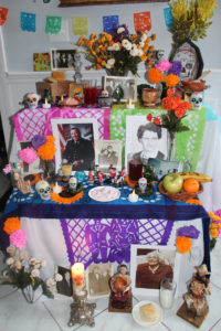 In Latin America, people include photographs of their beloved dead, intricate paper cutouts, flowers and favorite foods in their altars for the Day of the dead. (Photos courtesy of Tere Turner. 