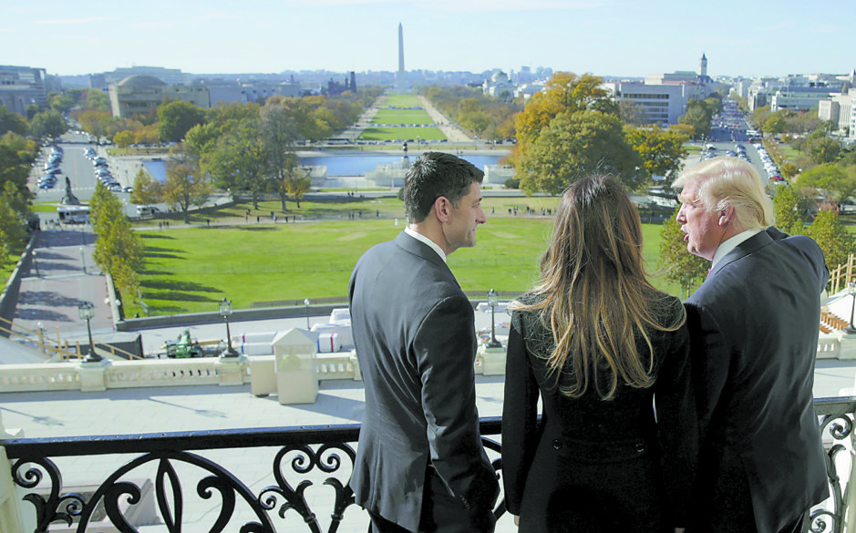 U.S. House Speaker Paul Ryan, R-Wis., shows Melania Trump and U.S. President-elect Donald Trump the Mall from his balcony on Capitol Hill in Washington Nov. 10. (CNS photo/Joshua Roberts, Reuters) See WASHINGTON-LETTER-ELECTION-UNITY Nov. 11, 2016.