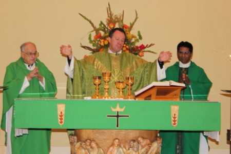 Father Sam Messina, former pastor, and Father Channappareddy Basani, present pastor, concelebrated. (Photo courtesy of Lynn Kyle)