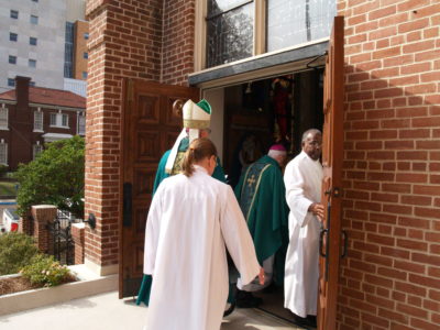Bishop emeritus Joseph Latino and Bishop Joseph Kopacz enter the Holy Door at the Cathedral of St. Peter the Apostle to start the Mass that would end the Jubilee Year of Mercy. Mary Woodward, Chancellor, assisted at the Mass. 