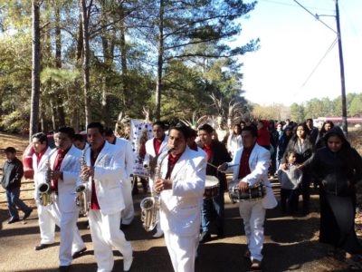 CARTHAGE – Members of St. Anne Parish band process around the church’s grounds playing songs to the Virgin of Guadalupe during her feast celebration Saturday, Dec. 10, at 9 a.m. Mass was celebrated after the procession. (Photo by Sister María Elena Méndez)