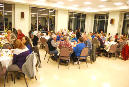 SOUTHAVEN - Christ the King members gathered for a feast after the Mass. 