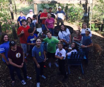 OXFORD – St. John Parish Total Youth Ministry (TYM) recently headed for the woods at a private farm south of Oxford. The annual farm party counted 20 TYM members who enjoyed cooler weather cooking hot dogs and smores while taking part in their annual cleaning and clearing an abandoned cemetery. (Photos by Mary Leary)