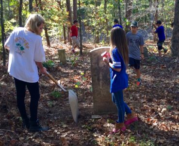 OXFORD – St. John Parish Total Youth Ministry (TYM) recently headed for the woods at a private farm south of Oxford. The annual farm party counted 20 TYM members who enjoyed cooler weather cooking hot dogs and smores while taking part in their annual cleaning and clearing an abandoned cemetery. (Photos by Mary Leary)