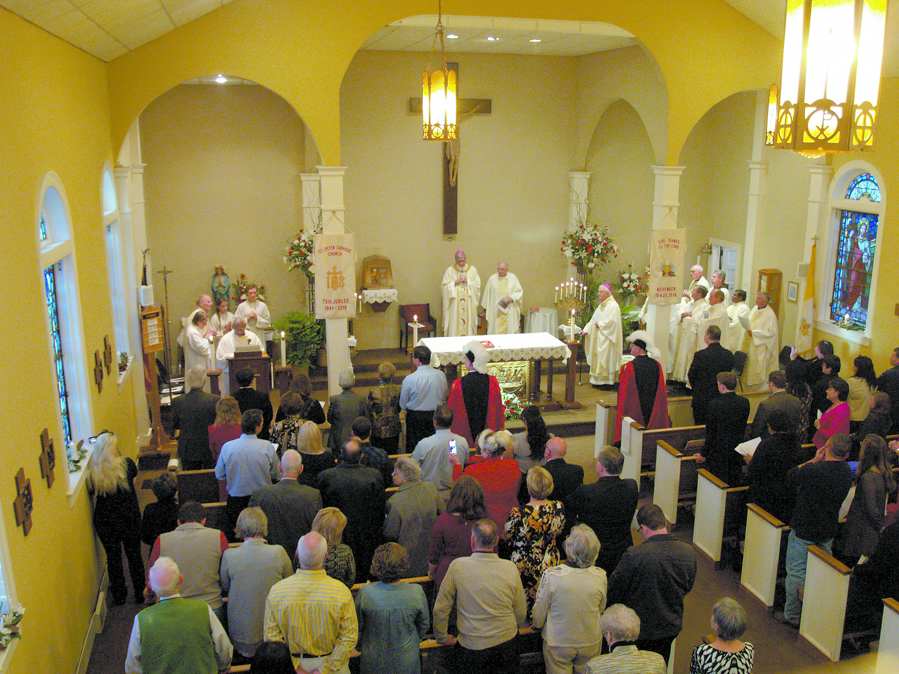 The sanctuary was full for the Grenada St. Peter 75th anniversary Mass. 