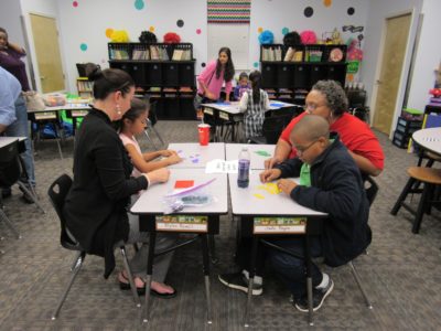 MERIDIAN – St. Patrick School recently hosted a Family Math Night. Families who attended played fun math games created by the teachers. Door prizes were also awarded.  Mary Zettler, Lily Zettler, April Stewart and Christian Rackley play one of the math games. (Photos by Helen Reynolds)