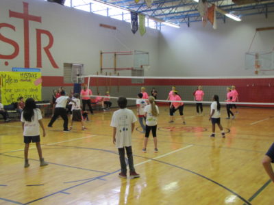 JACKSON – Students soundly defeated their teachers and pastor Father John Bohn in a game of Newcomb, a game much like volleyball, against to cap off their Catholic Schools Week celebration. (Photos by Chris Lombard.) 