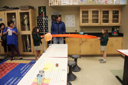 MADISON – Students at Madison St. Anthony School got to show their parents all around their school, including demonstrating the work they do in the computer lab during STREAM night as part of Catholic Schools Week. In the art studio, students demonstrated a motion and balance with a kinetic sculpture, they downloaded and showed off their apps in the computer lab, showed how “Math is everywhere in the math lab and took on an engineering challenge in the media center. STREAM stands for the integration of science, technology, religion engineering, art and math. (Photo courtesy of Kristin Beatty) 