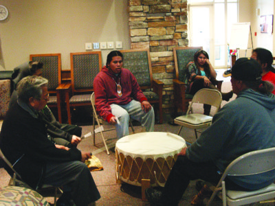 The large drum allows several musicians and singers to join in the performance. (Photos by Maureen Smith)
