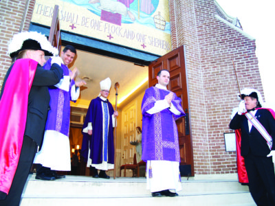 JACKSON – Deacon Nick Adam, left, Bishop Joseph Kopacz and Deacon Aaron Williams leave the cathedral after Williams’ ordination Saturday, March 18. See details of both ordinations on pages 8-9. (Photo by Maureen Smith)
